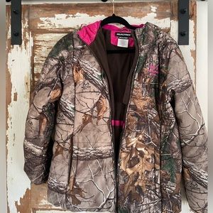 Real tree girls jacket with pink inside lining. Very warm perfect condition.